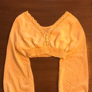 Cropped blouse, polka dots, lightweight.